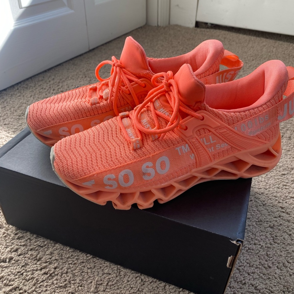 Orange running sneakers